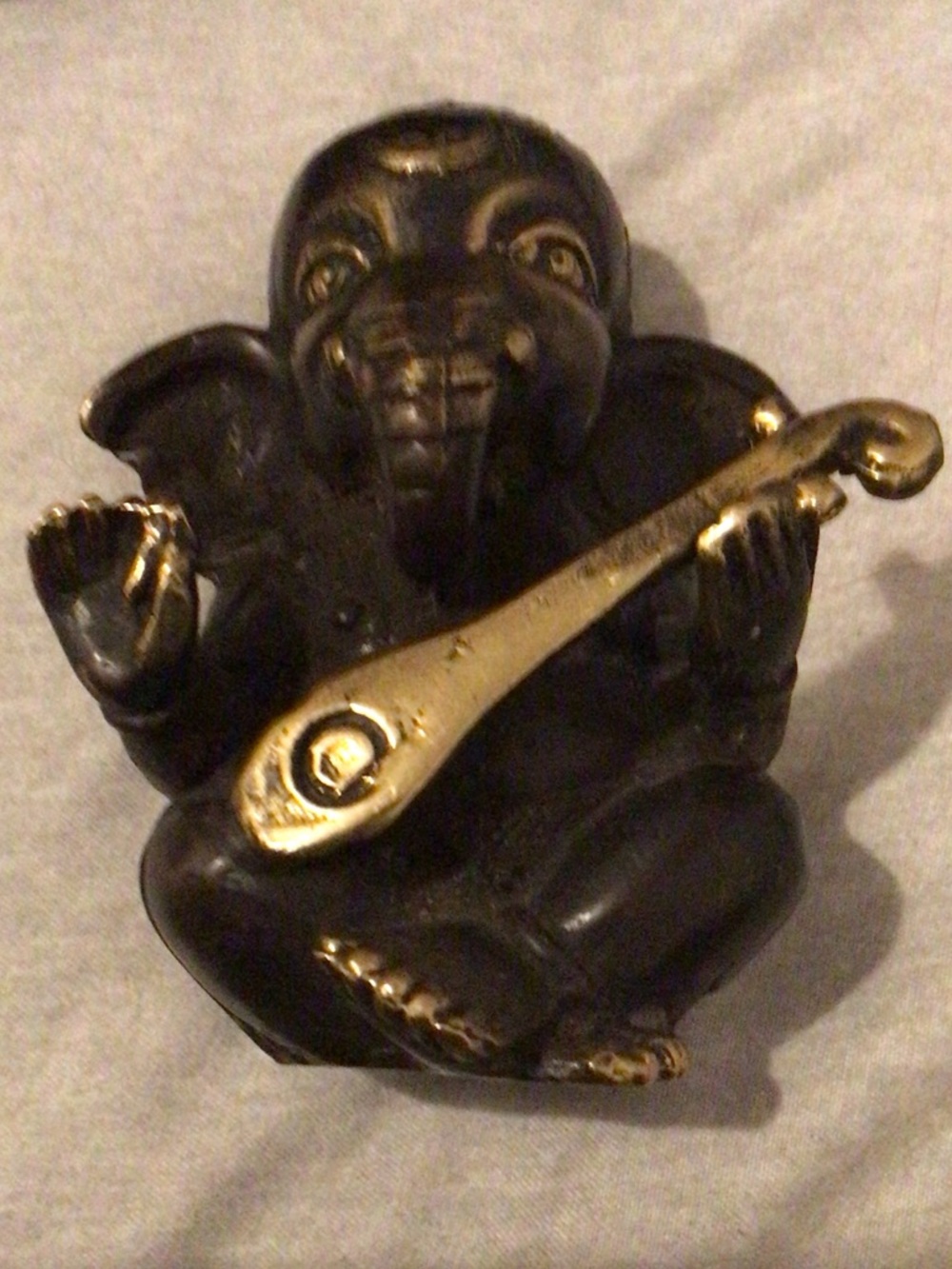Black and Gold Elephant Ganesh Figurine with Instrument Ganesha